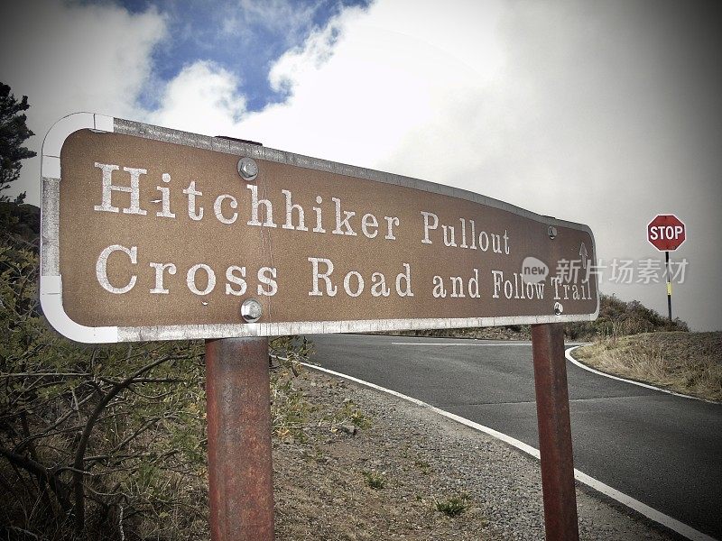 hitchhiker pullout - signage on the road to the summit of haleakalā national park.